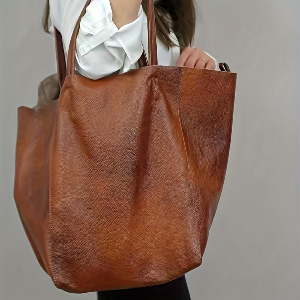 sac à main vintage en cuir, élégant et confortable pour toutes les saisons