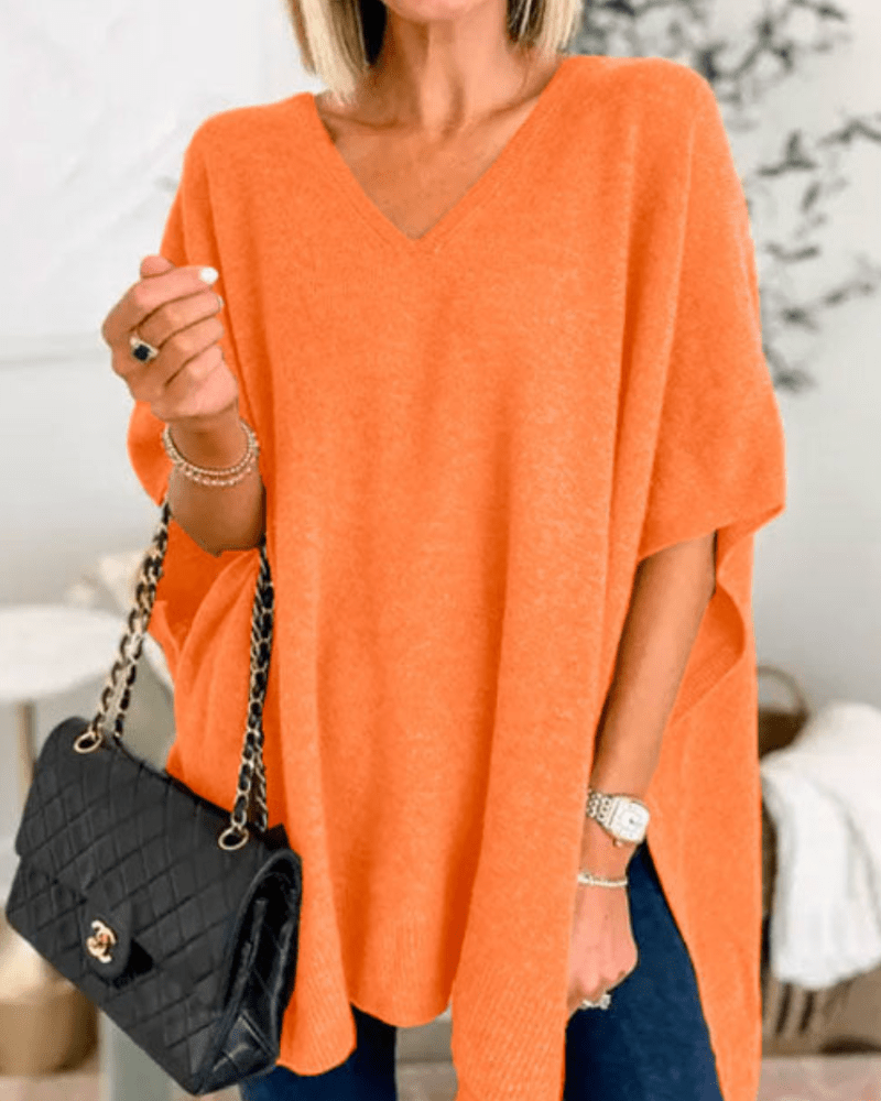 Poncho en laine douce, décolleté en V et coupe confortable pour l'hiver