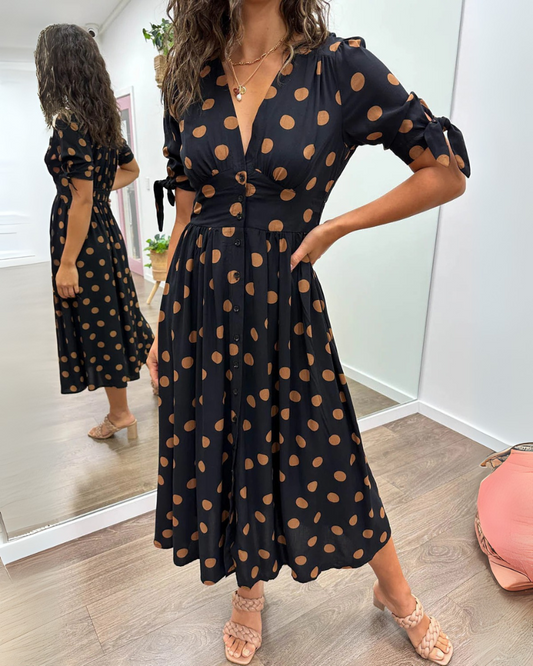 robe à pois en tissu doux, coupe évasée pour un confort élégant